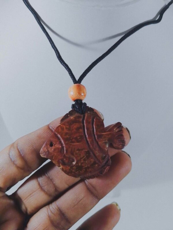 CocoWave – Handcrafted Fish-Shaped Coconut Shell Pendant