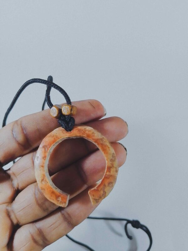 handmade circular coconut shell pendant - Image 4