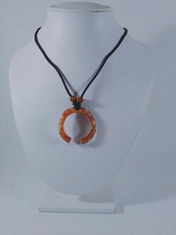 handmade circular coconut shell pendant